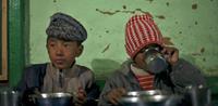 Meal time at Jhamtse Gatsal Children Community, Indian Himalayas ©Andrew Hinton
